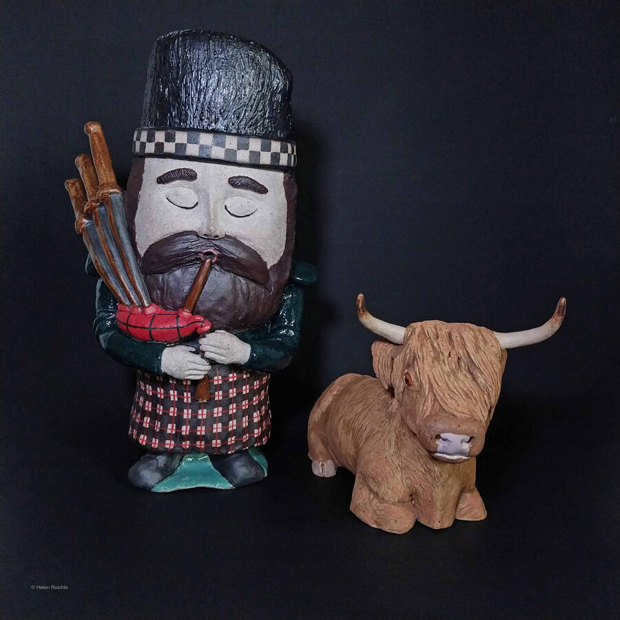 A bearded garden gnome dressed as a Scottish bagpiper with a red, black and white plaid kilt, dark green shirt, and black and white checkered bonnet inflates his black and red plaid bagpipes.